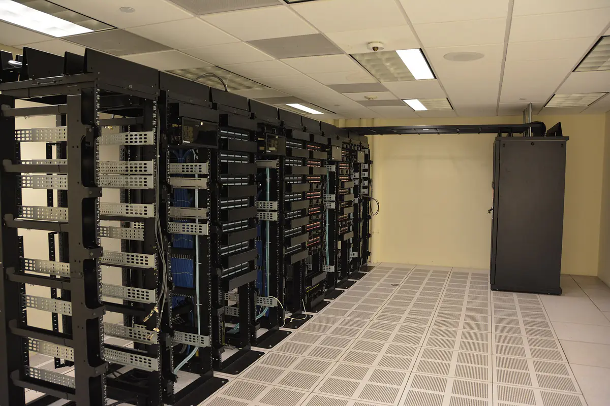 Rows of server racks in a data center