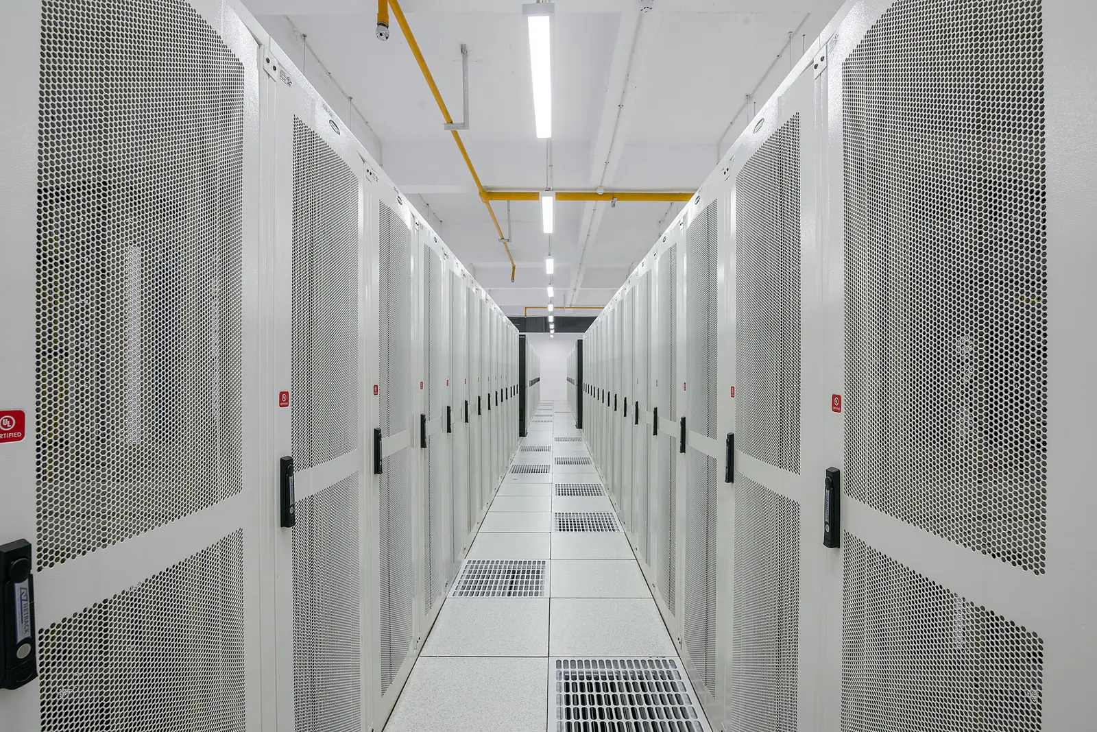 Rows of server racks inside a data center