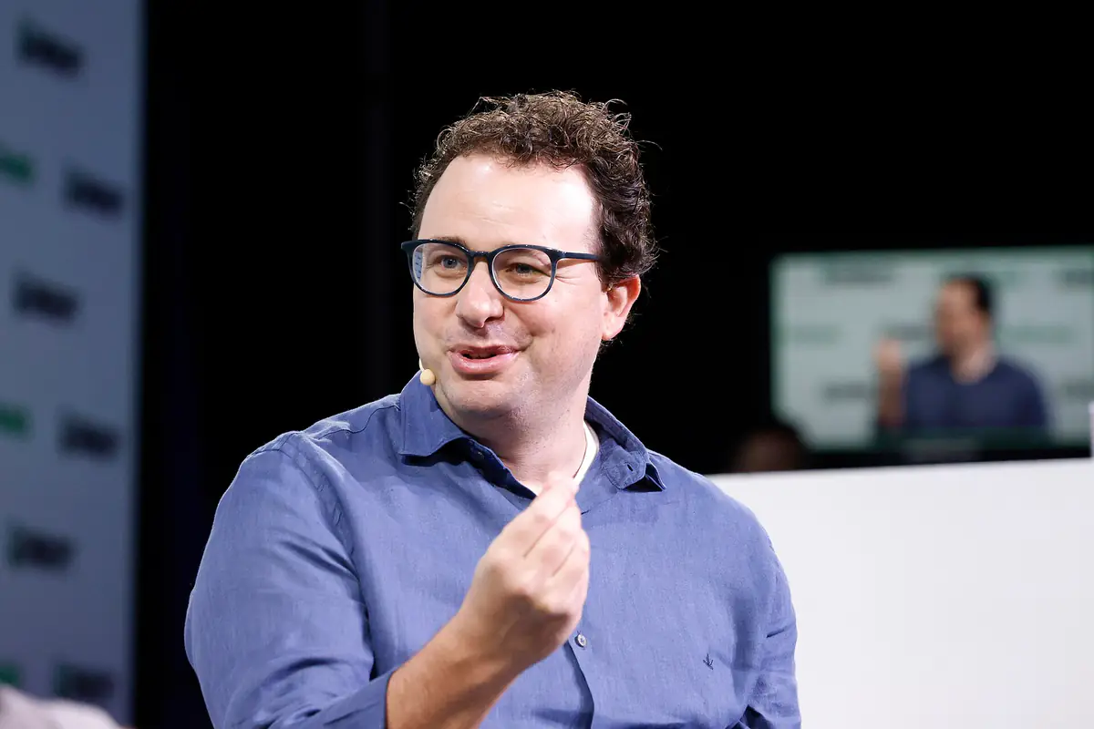 Anthropic chief executive Dario Amodei speaking on stage at TechCrunch Disrupt 2023